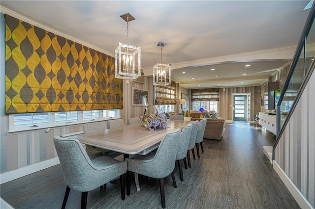 dining room with wallpapered walls, baseboards, dark wood finished floors, and ornamental molding