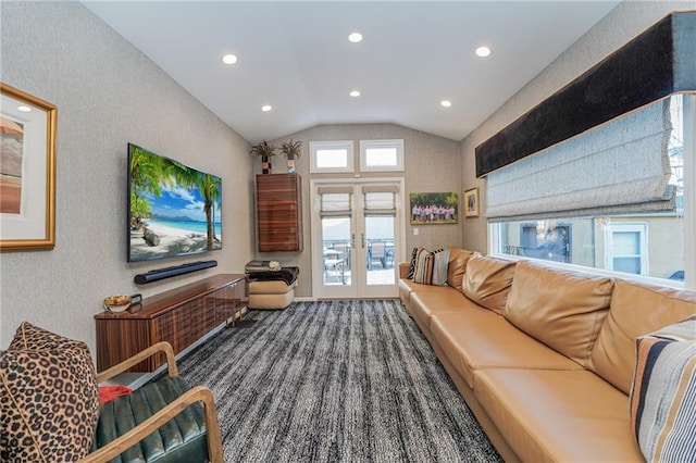 carpeted living area featuring lofted ceiling, french doors, and recessed lighting