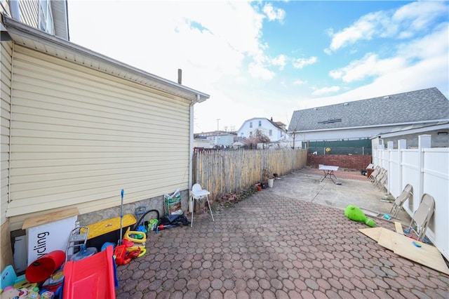 view of patio with a fenced backyard