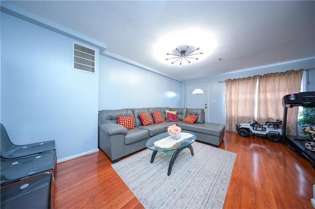 living room with dark hardwood / wood-style floors