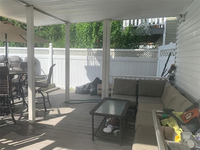 deck with an outdoor living space