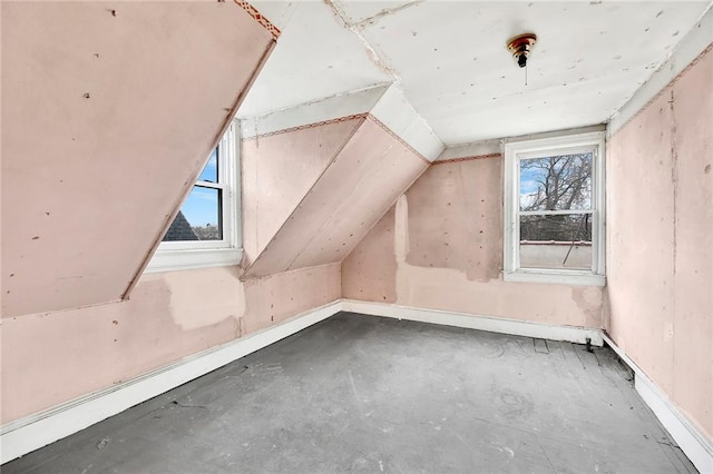 bonus room featuring lofted ceiling