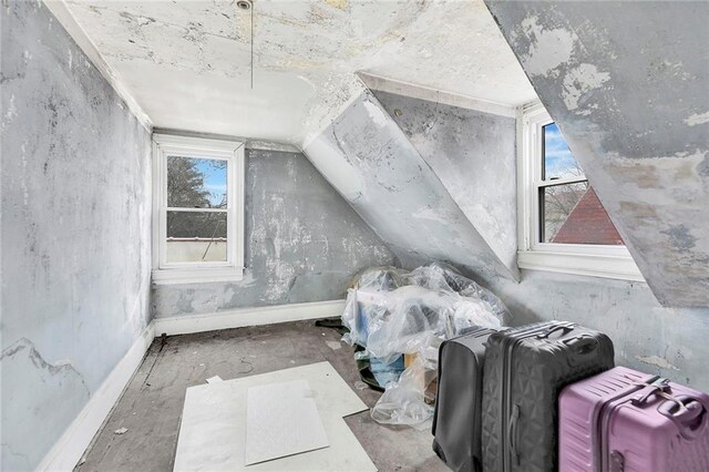 bonus room featuring vaulted ceiling