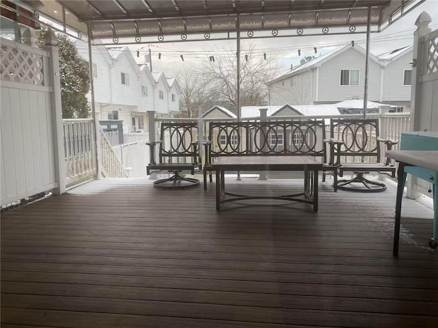 wooden deck featuring outdoor dining space