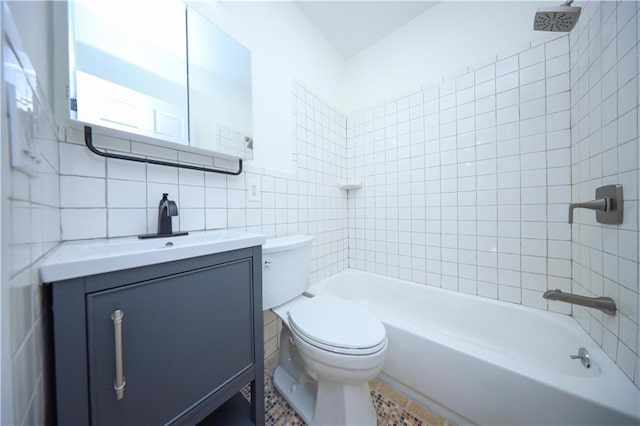 full bathroom featuring backsplash, vanity, tile walls, toilet, and tiled shower / bath