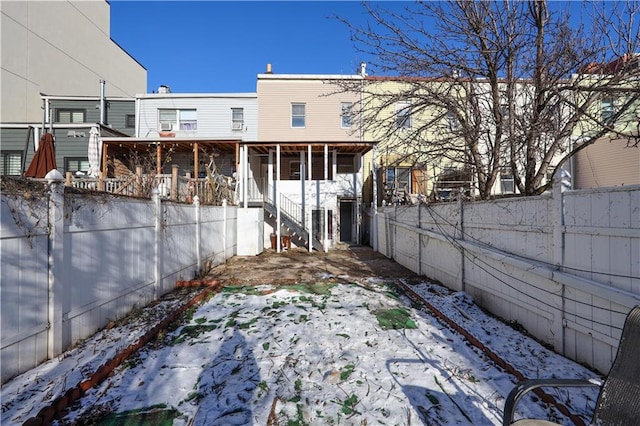 view of yard covered in snow