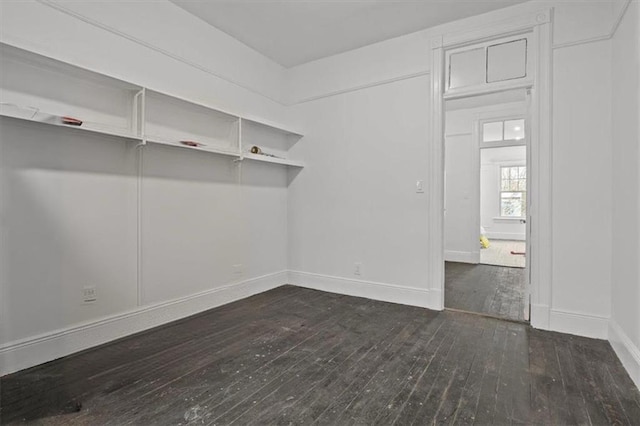 interior space with dark hardwood / wood-style floors