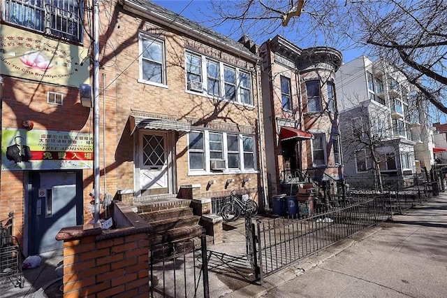 view of front of home featuring cooling unit