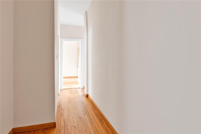 hallway with light wood-type flooring