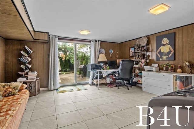 office space with tile patterned floors and wooden walls