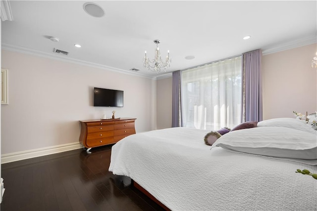 bedroom featuring a chandelier, dark wood-style flooring, visible vents, baseboards, and ornamental molding