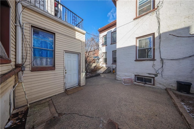 property entrance with a patio area