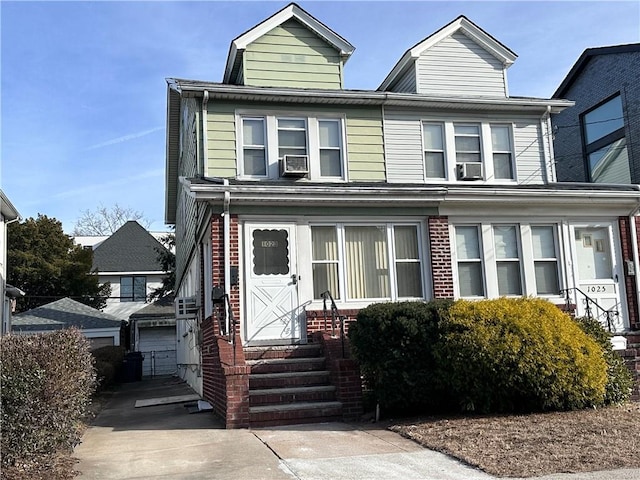 view of front of home with cooling unit