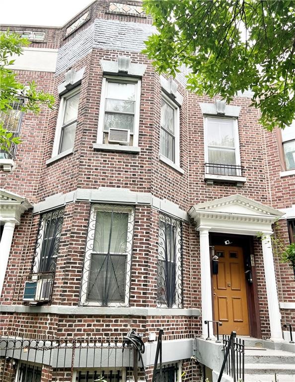 view of front of property with brick siding