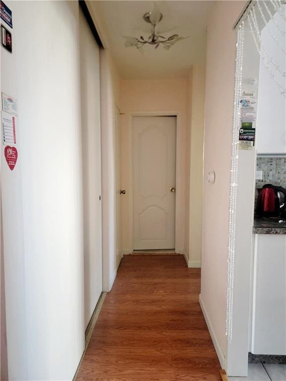 hallway featuring light wood-style floors