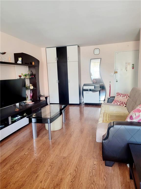 living area featuring light wood-style flooring