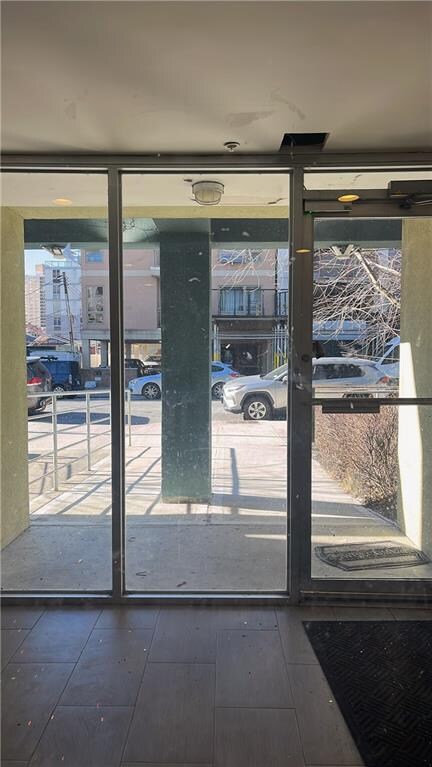 doorway to outside featuring plenty of natural light