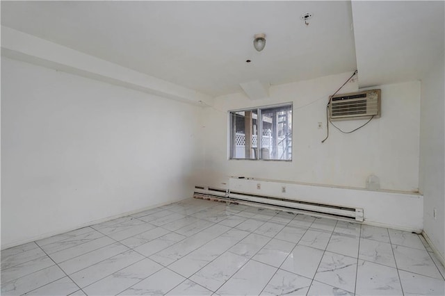empty room with a baseboard radiator, a wall unit AC, and marble finish floor