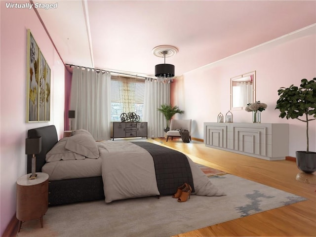 bedroom featuring hardwood / wood-style flooring