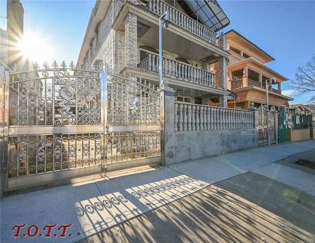 view of front of property with a balcony