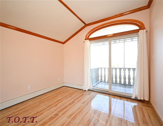 spare room with crown molding, vaulted ceiling, and a baseboard heating unit