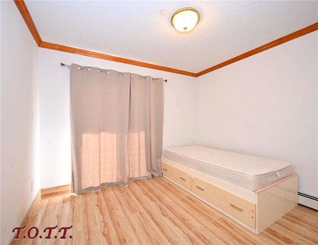 unfurnished bedroom with a baseboard heating unit, crown molding, and light hardwood / wood-style flooring