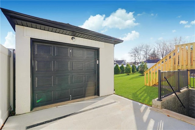 garage with a lawn