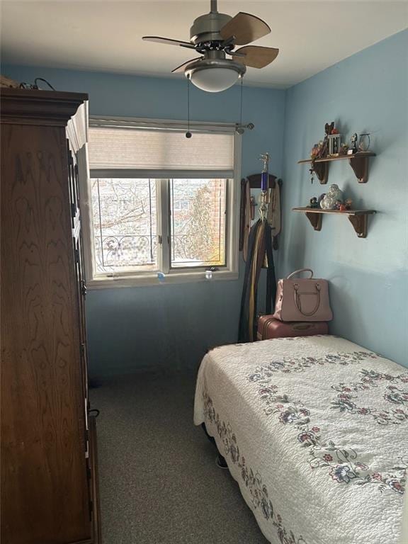 carpeted bedroom featuring ceiling fan