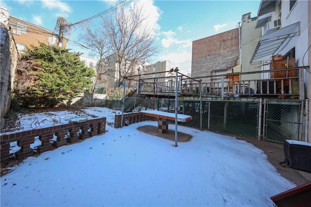 view of yard covered in snow