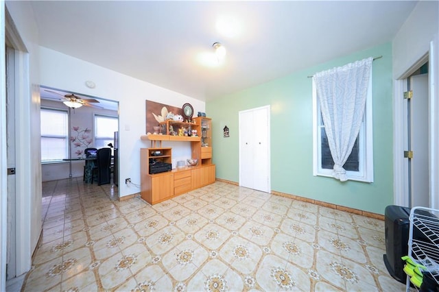 living room with ceiling fan