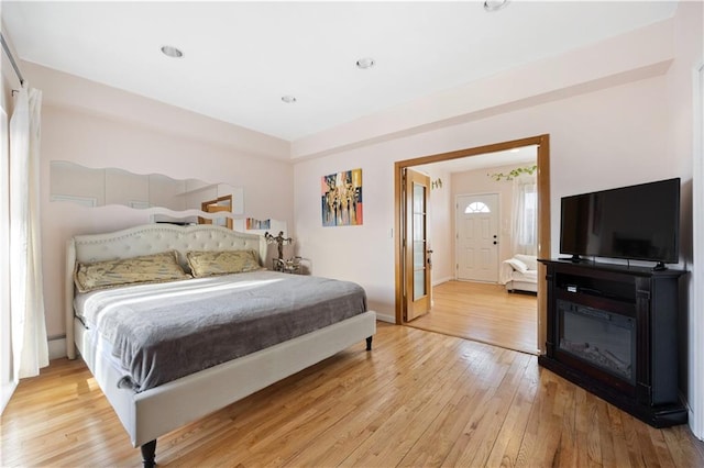 bedroom featuring light hardwood / wood-style flooring