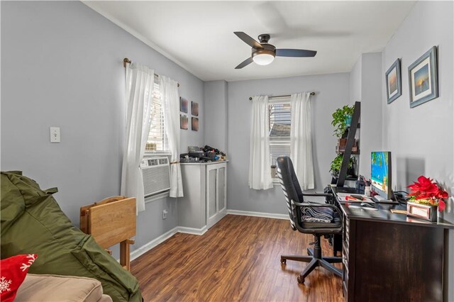 office space featuring ceiling fan, dark hardwood / wood-style flooring, cooling unit, and plenty of natural light