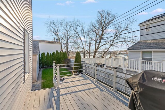 wooden terrace with grilling area