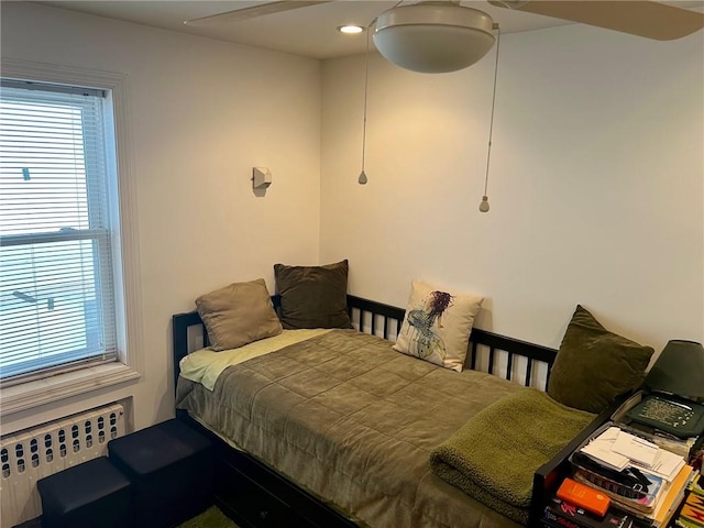 bedroom featuring radiator heating unit