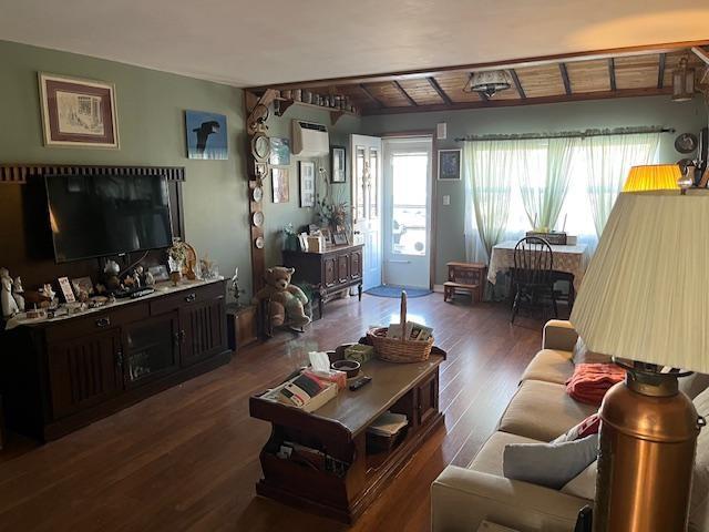 living area with wood finished floors