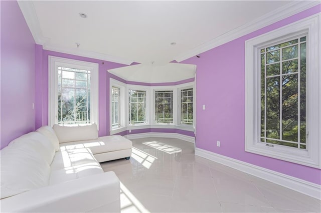 tiled living room with ornamental molding and baseboards