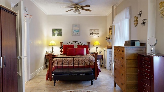 bedroom featuring ceiling fan, baseboards, ornamental molding, and light tile patterned floors