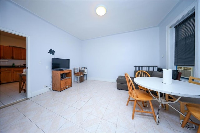 dining room with cooling unit and light tile patterned flooring