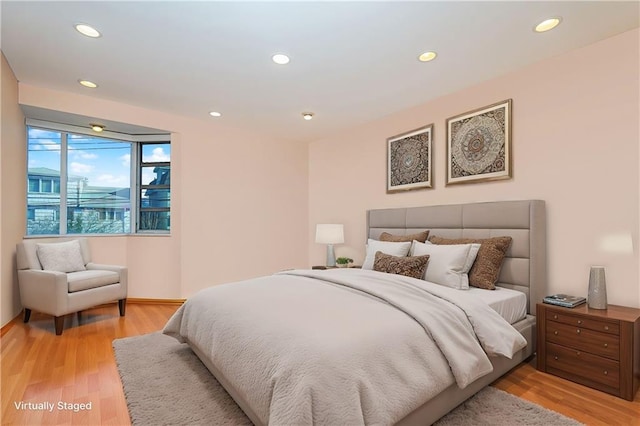 bedroom featuring light wood-type flooring