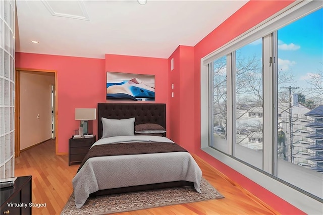 bedroom featuring wood-type flooring