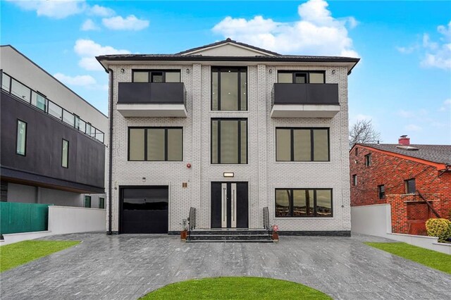 contemporary home featuring a garage