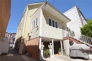 exterior space with a carport