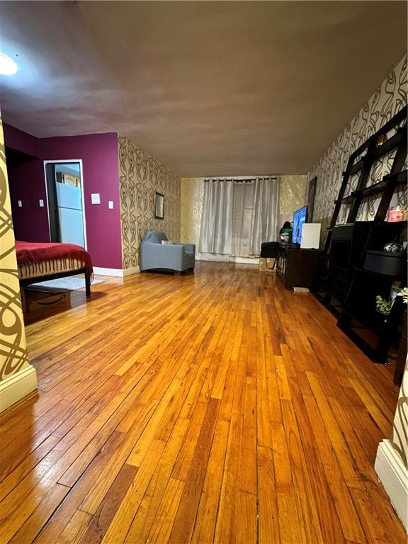 interior space with hardwood / wood-style floors