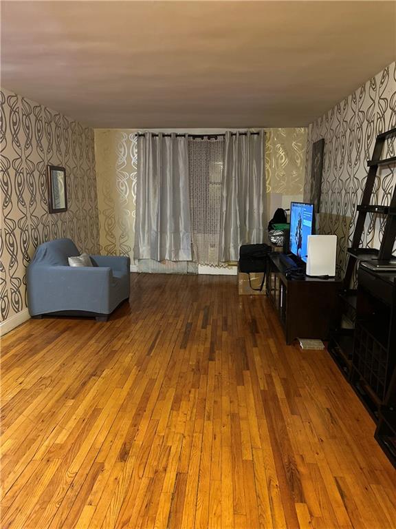 living area featuring hardwood / wood-style floors