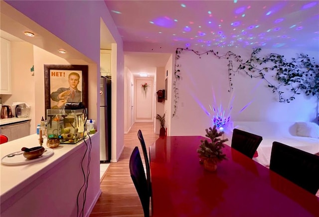 dining room with light wood-type flooring