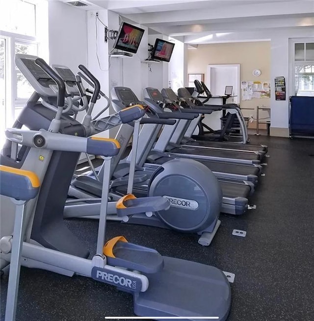 workout area featuring visible vents