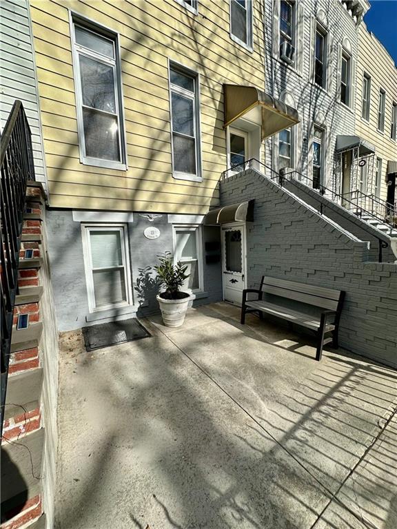 13 Windsor Pl, Brooklyn, NY 11215 - rear view of property with stairs and a patio area