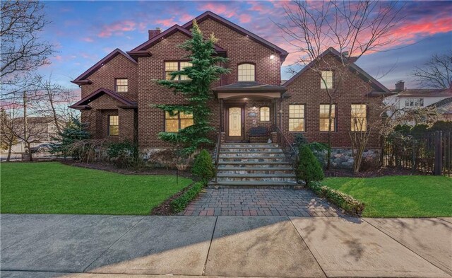 view of front property with a lawn