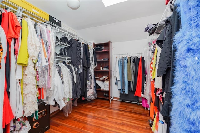 spacious closet with wood finished floors