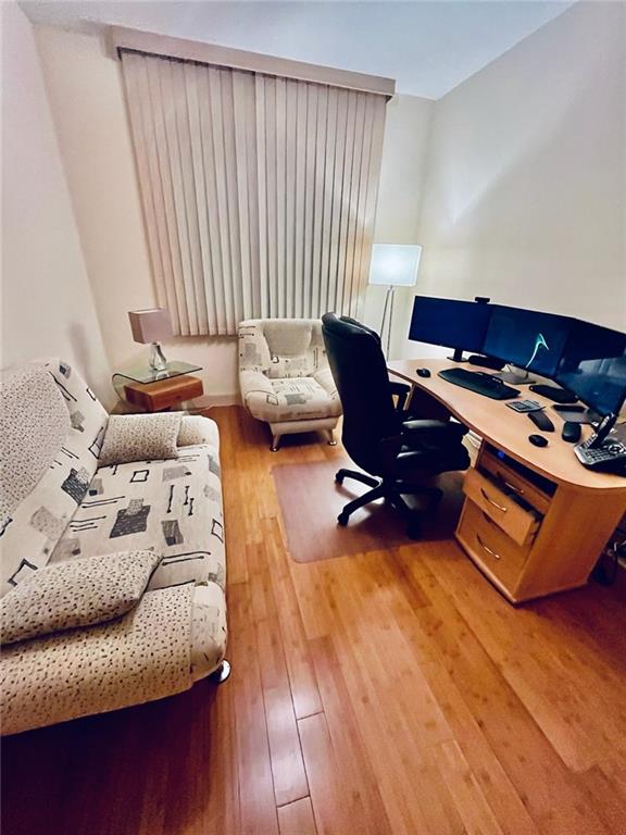 office space with wood finished floors